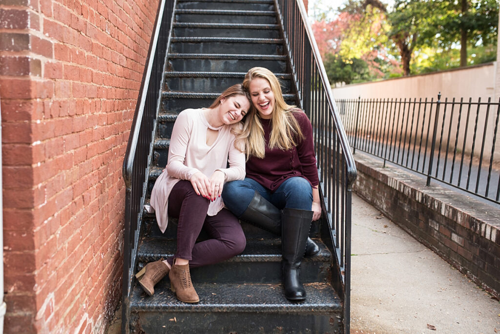 Maryland teen girls laughing together in Downtown Frederick.